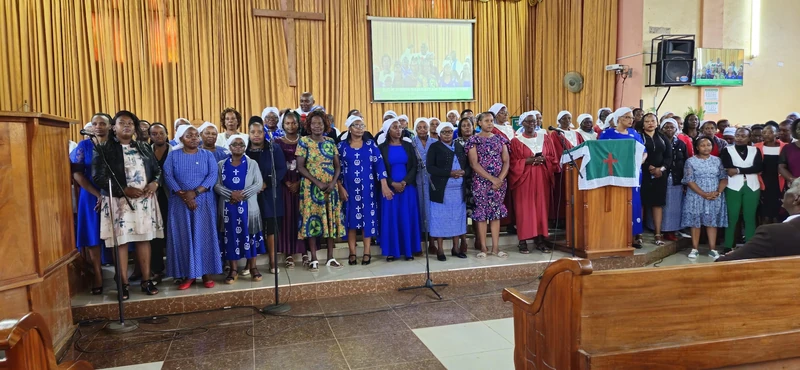 Women's fellowship members gathered outside the church